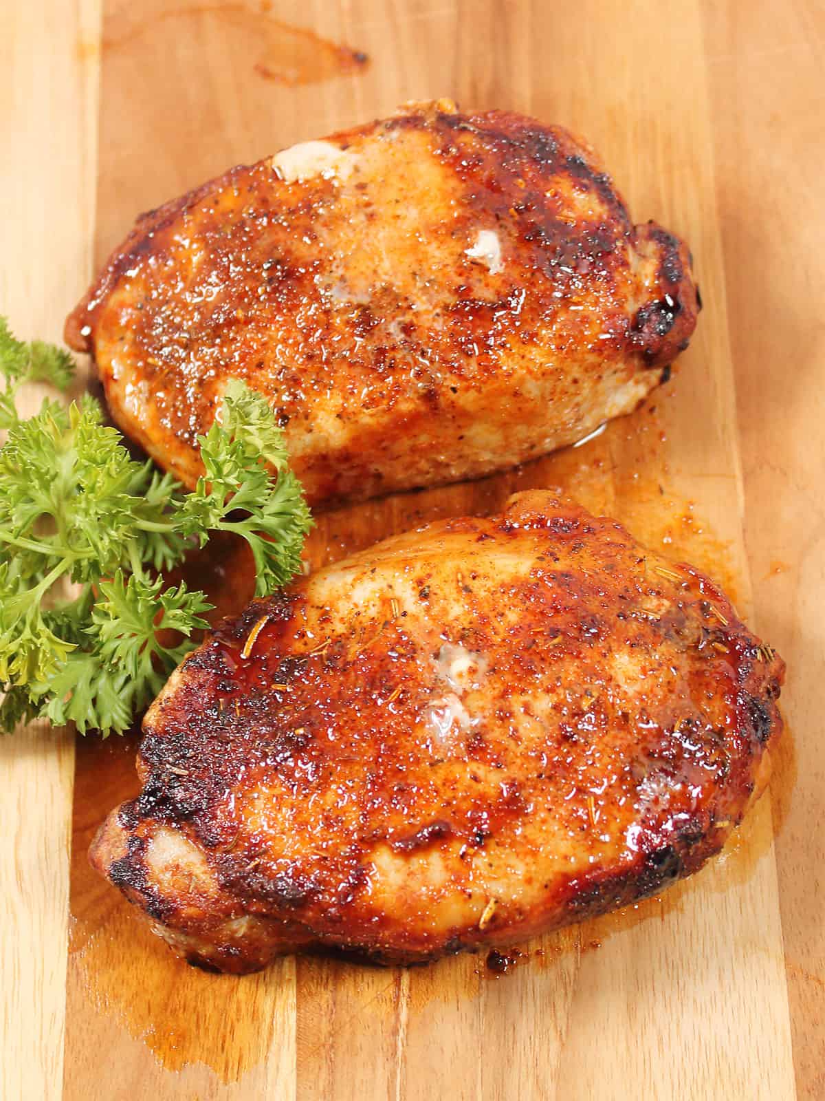 Golden brown pork chops cooked from frozen in air fryer.