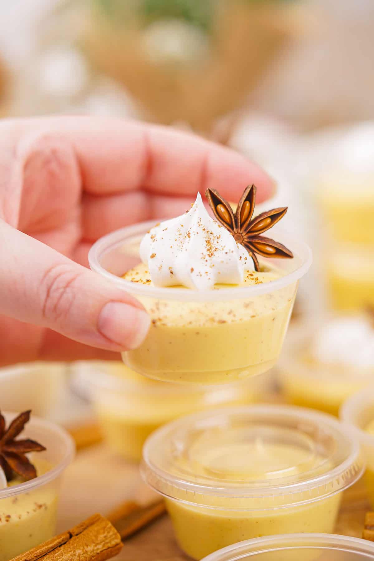 Toasting with eggnog shot.