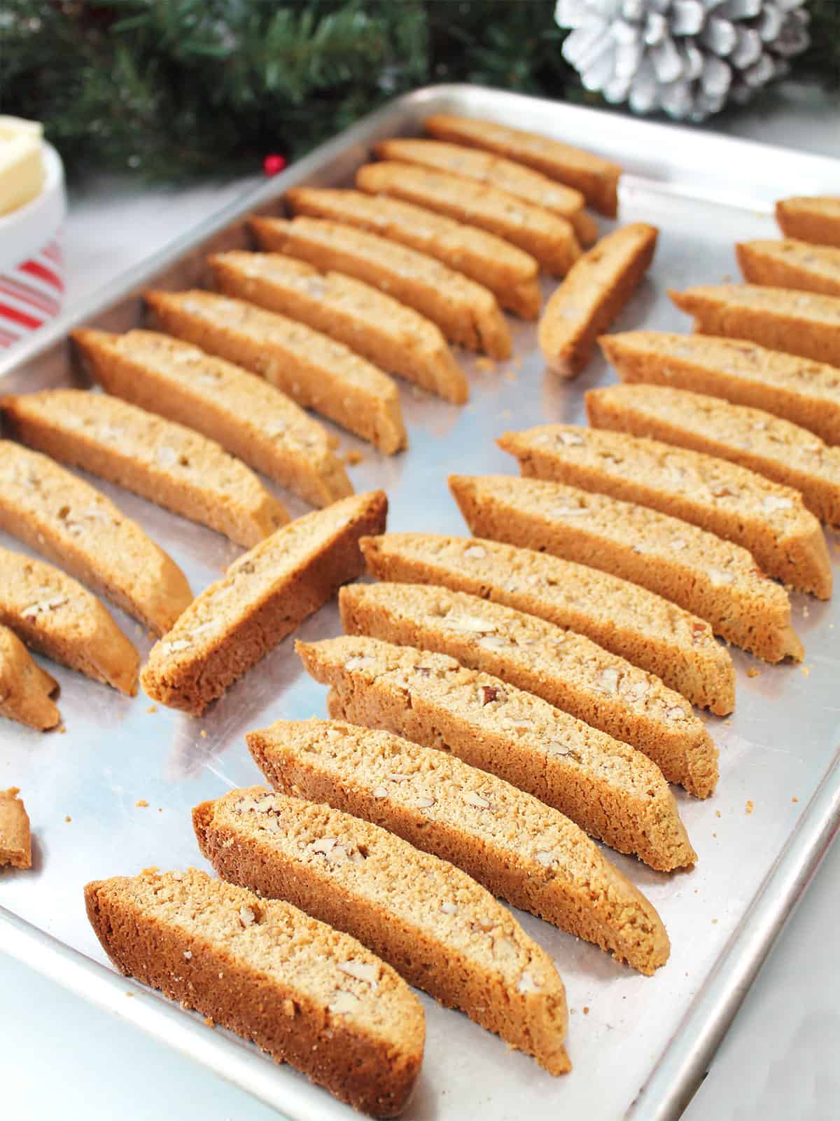 Baked biscotti on cookie sheet.