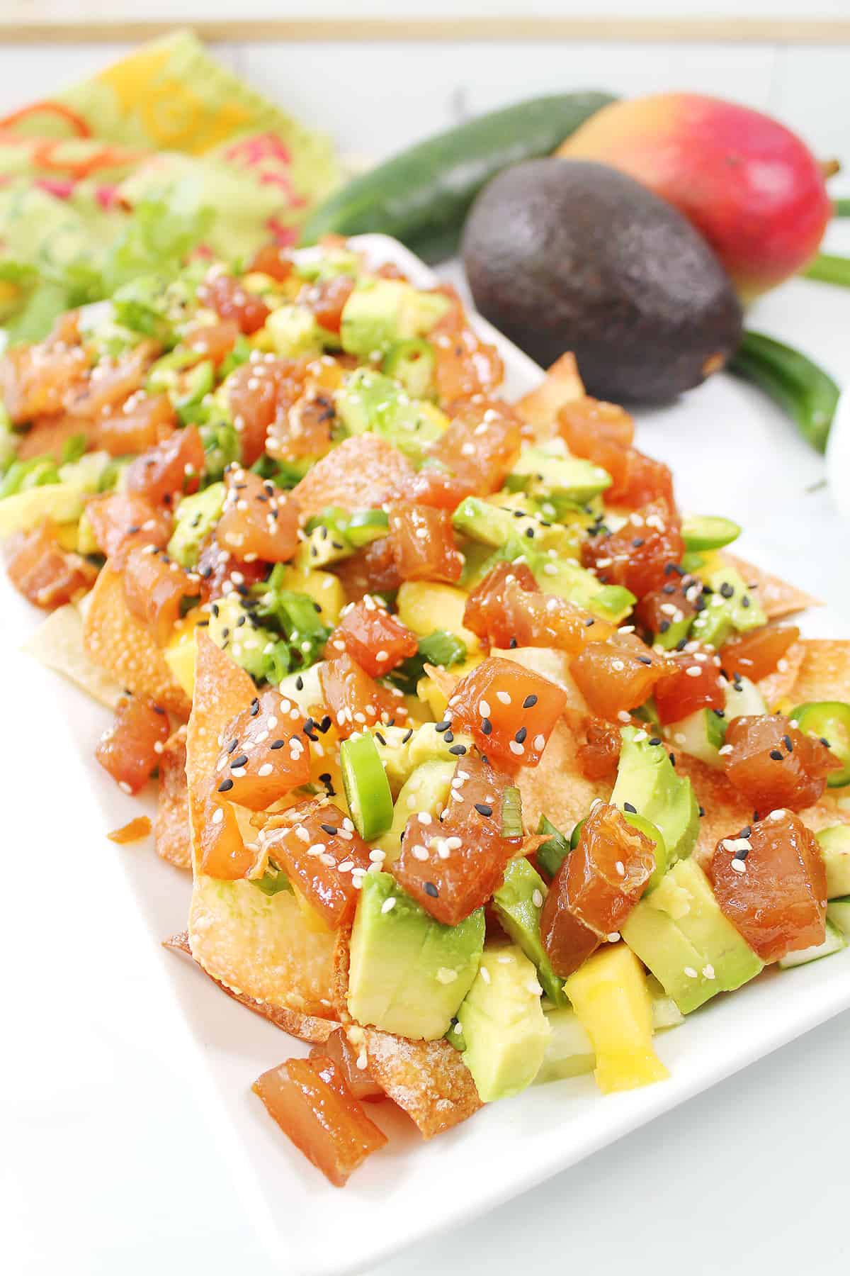Closeup of Tuna Wonton Nachos layered on platter.
