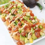 Tuna Poke Nachos with wasabi mayo.
