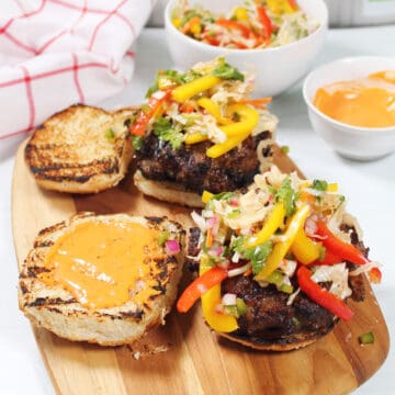 Bulgogi Burgers on toasted buns topped with Korean slaw.