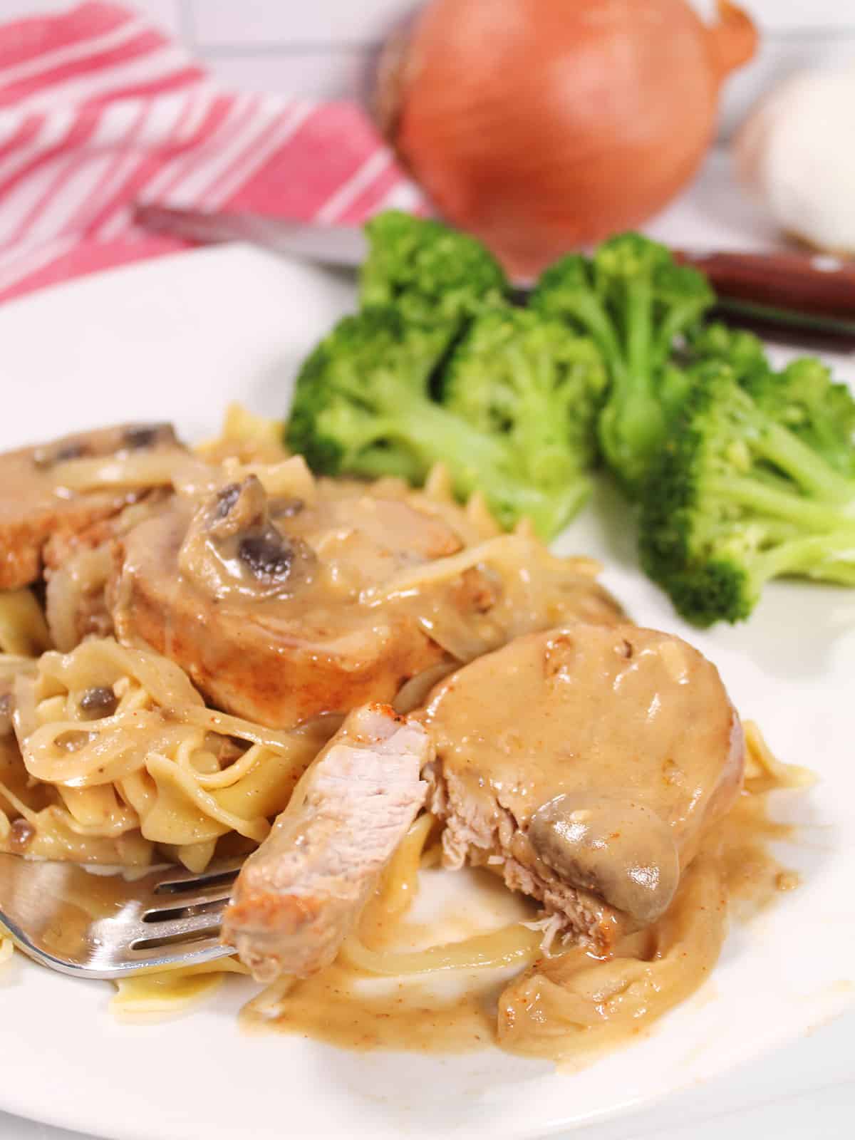 Bite out of pork medallions dinner.