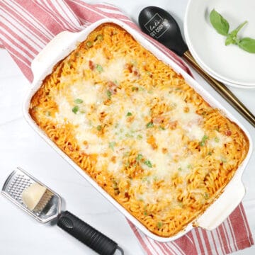 Baked Chicken alla Vodka Casserole on striped towel.