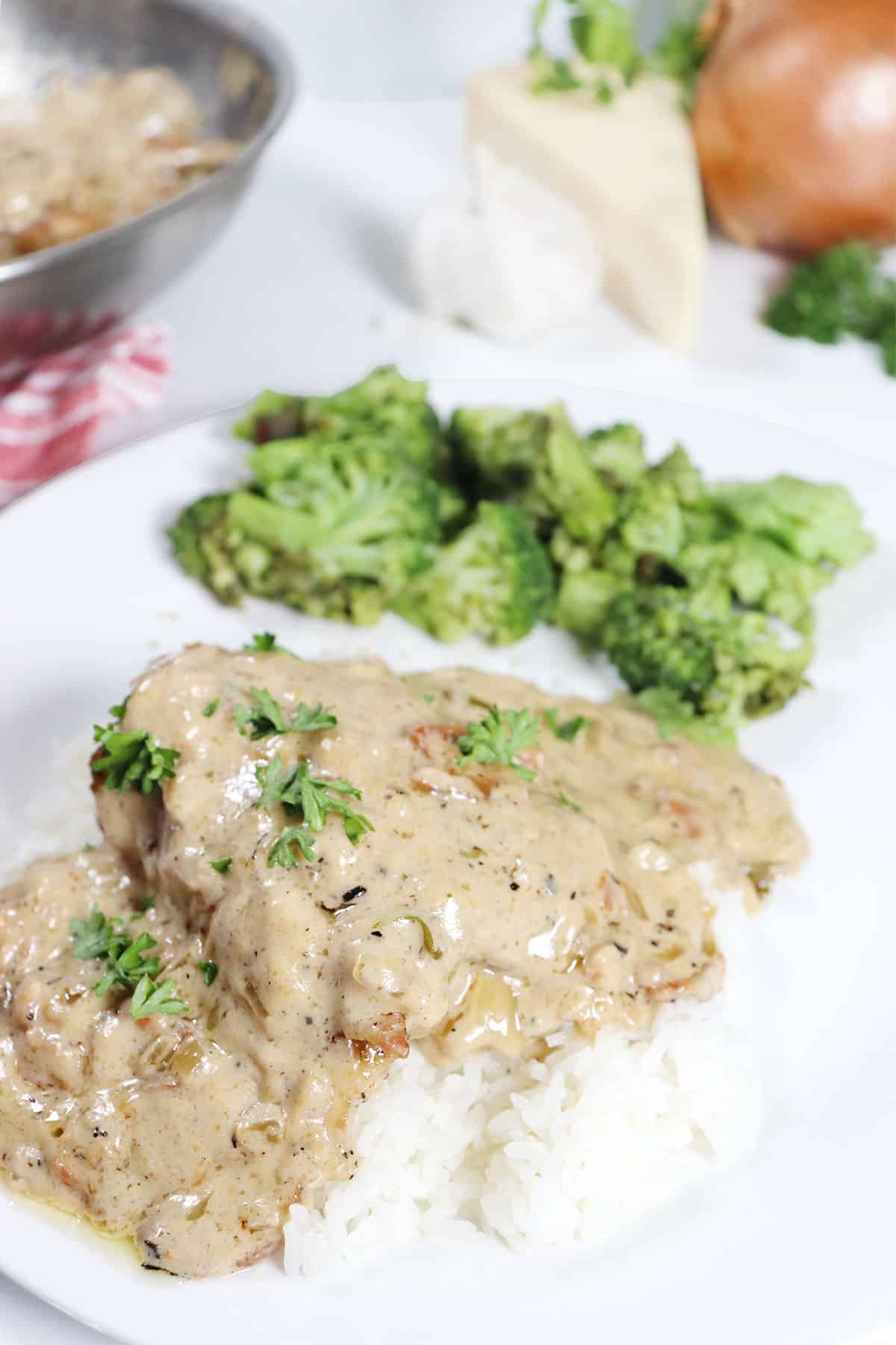 Garlic Parmesan Chicken Thighs served over rice.
