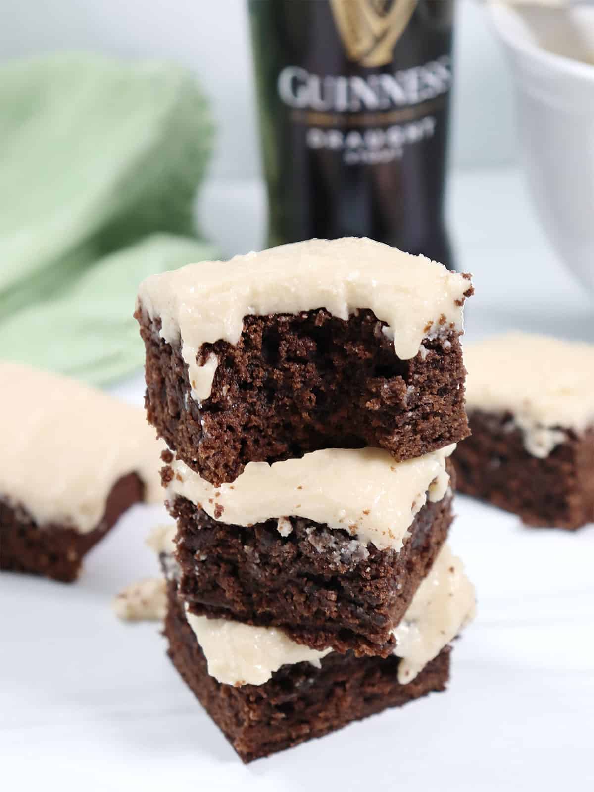 Easy Guinness Brownies stacked with bite out.