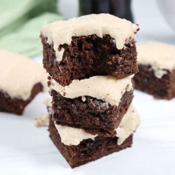 Stacked Guinness Brownies with buttercream frosting.