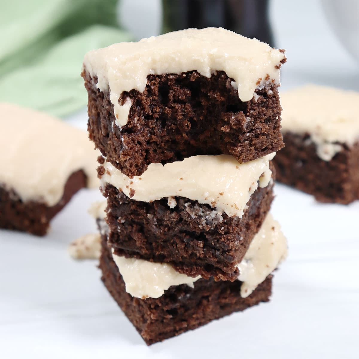 Stacked Guinness Brownies with buttercream frosting.