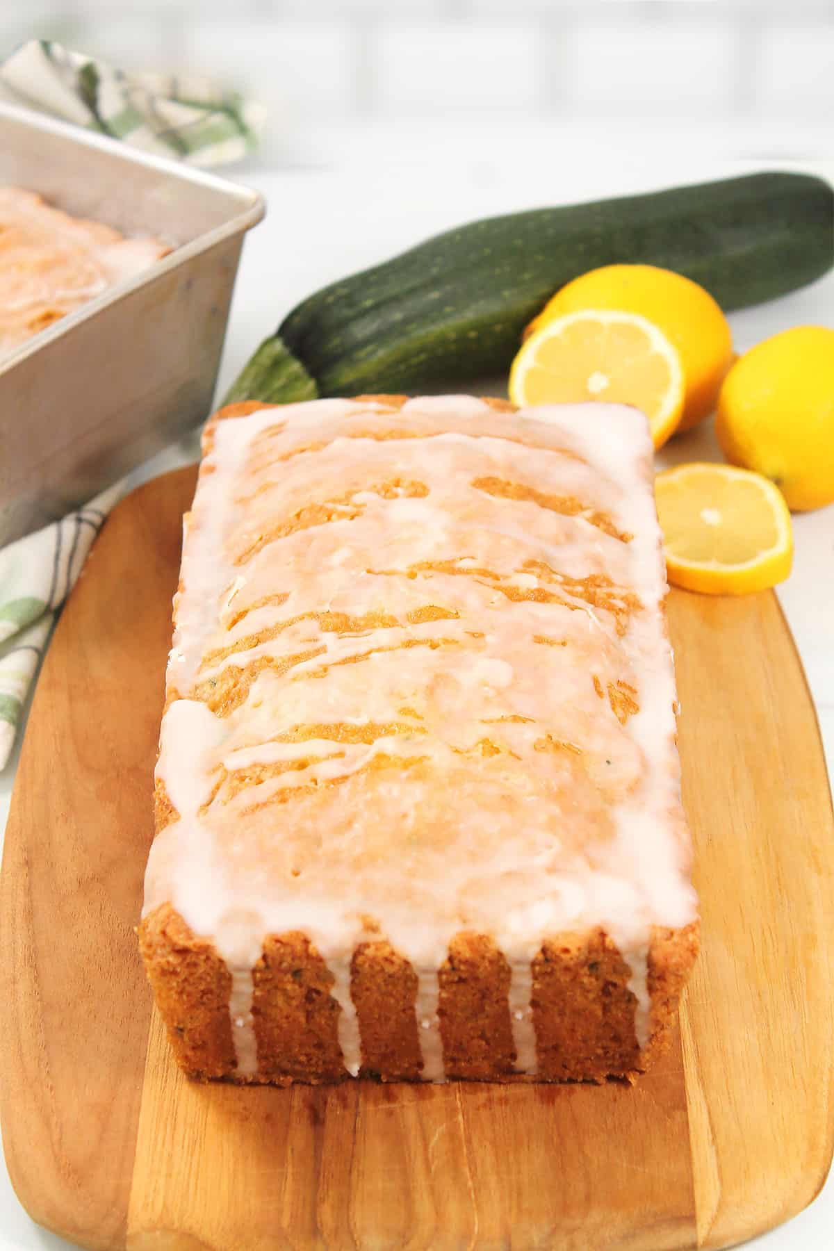 Zucchini Lemon Bread loaf with lemon glaze.