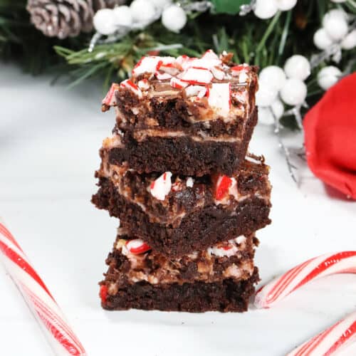 Peppermint Candy Cane Swirl Brownies stacked.