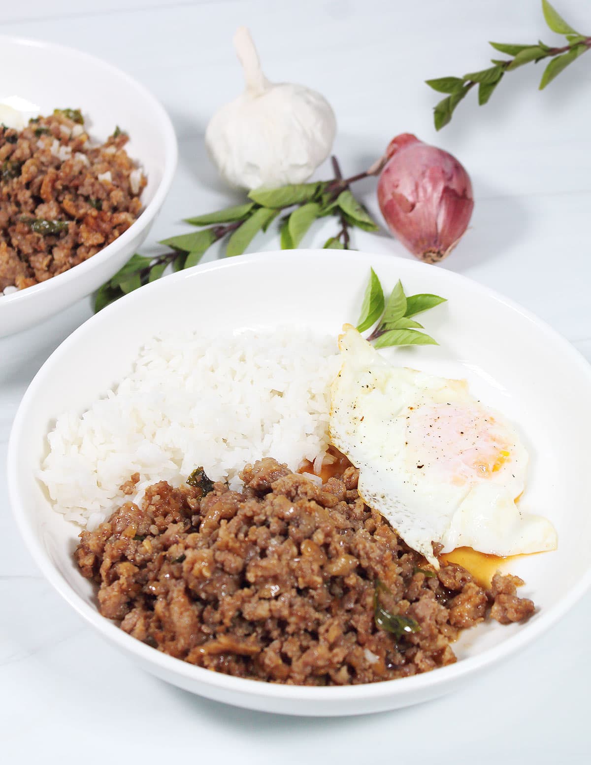 Serving of Thai Basil Pork with rice and fried egg.
