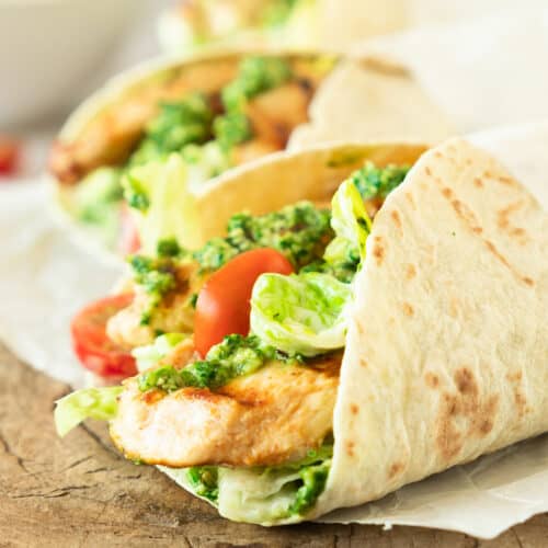 Two Pesto Chicken Caesar Wraps up close.
