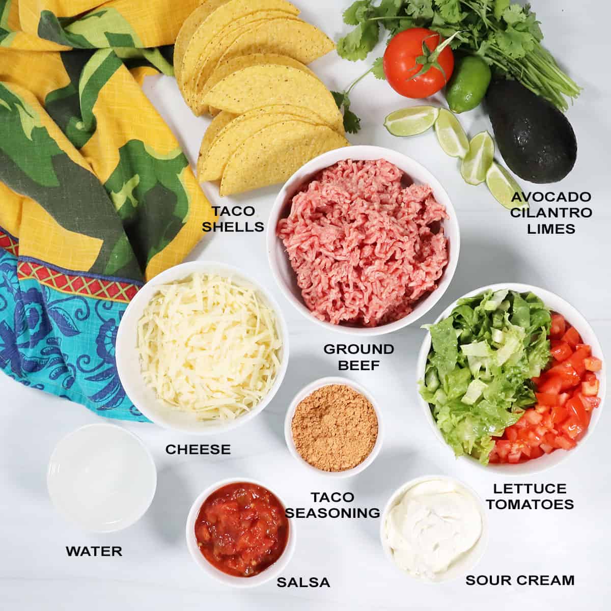 Ingredients for Mexican tacos with ground beef.