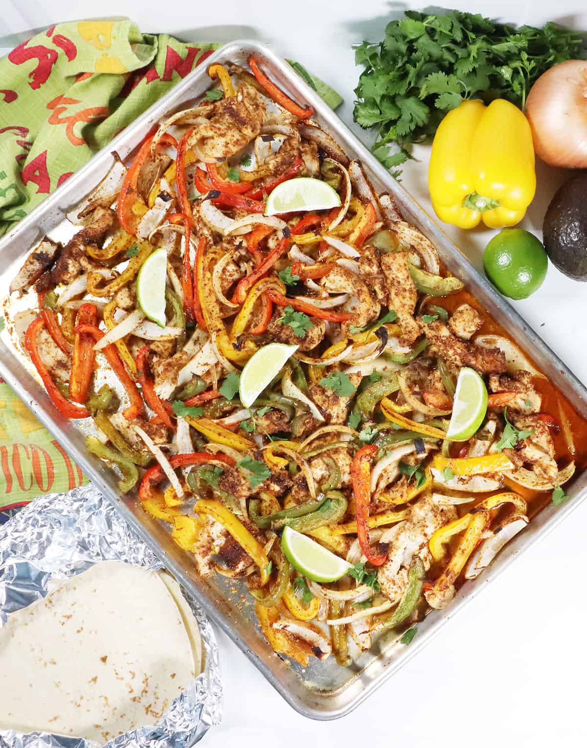 Sheet Pan Chicken Fajitas roasted on pan.